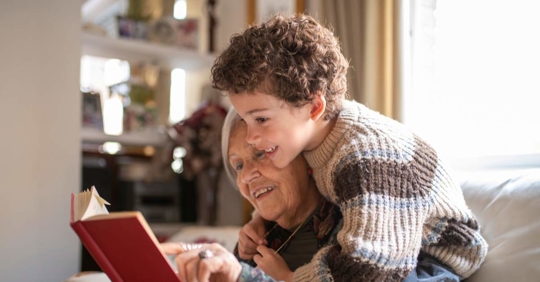 Grandmotehr and grandson comfortable indoors